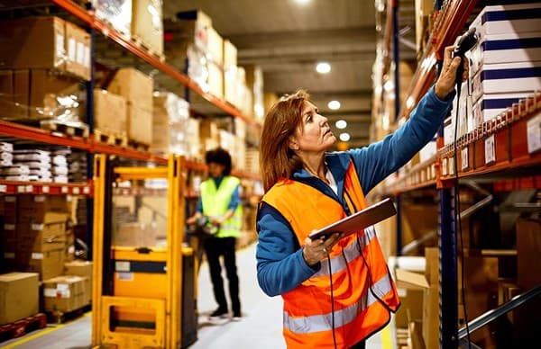Warehouse specialist checking inventory